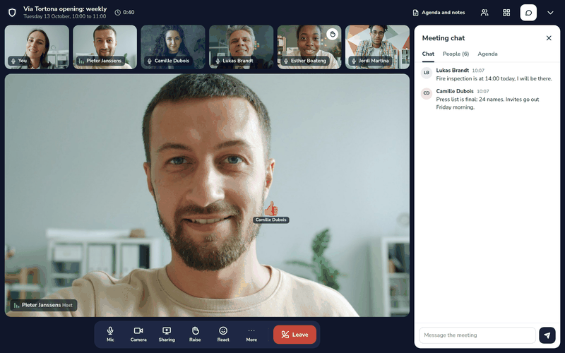 A meeting in Dazr Teams in speaker view, with a reaction and the meeting chat open